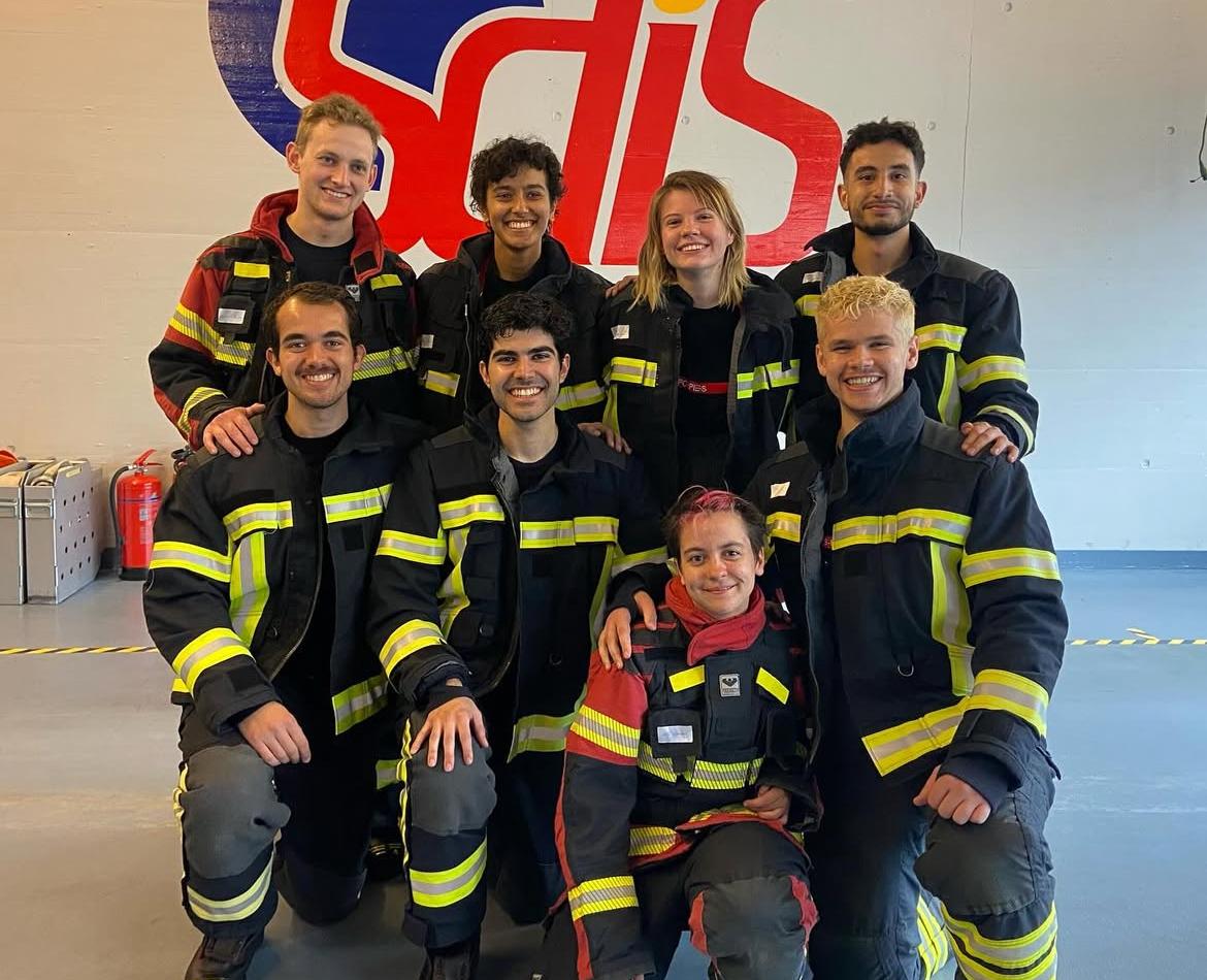 The Asclepios V crew in firefighter gear